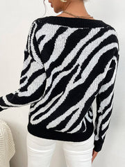 Pull noir à col en V imprimé zèbre 