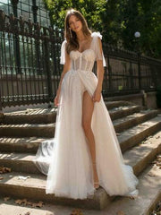 Robe de mariée transparente dos nu 