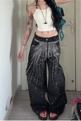Jean oversize délavé à étoiles et strass, coupe droite.