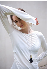 Sous-vêtement technique élégant en laine Tencel à ourlet asymétrique et coupe ajustée