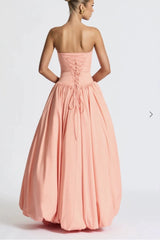 Robe de soirée jaune bustier asymétrique à nouer