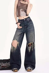 Jean vintage à ourlet brut, taille basse et jambes larges