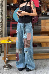 Jean maxi rétro déchiré à patchwork et éclaboussures de peinture