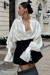 Chemisier chic, léger et transparent uni