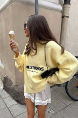 Pull jaune rétro ample à imprimé lettres