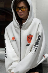 Sweat à capuche oversize zippé avec logo imprimé.
