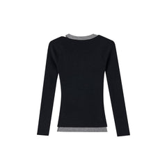 Gilet long élégant en maille noire avec découpes ajourées