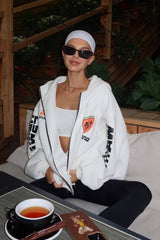 Sweat à capuche oversize zippé avec logo imprimé.