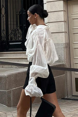 Chemisier chic, léger et transparent uni