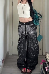 Jean oversize délavé à étoiles et strass, coupe droite.