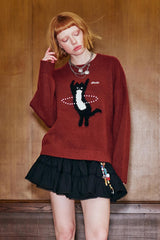 Pull en maille avec chat dansant