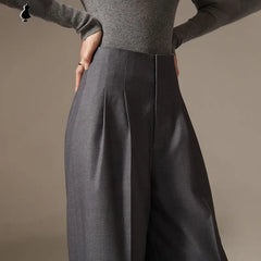Pantalon à jambes larges et taille cintrée drapée