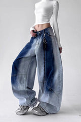 Jean vintage taille haute, jambes larges, délavage dégradé et coupe cintrée