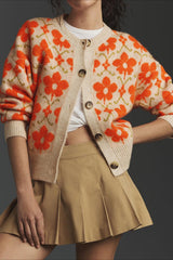Cardigan élégant en maille à manches longues, à boutons et à motif jacquard fleuri.