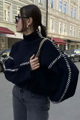 Pull col roulé colorblock style urbain