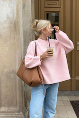 Pull en maille rose poudré à col rond
