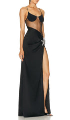 Robe longue noire à corsage en résille orné d'étoiles de mer