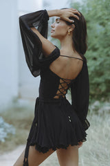 Robe en mousseline avec manches gigot et jupe à volants