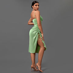 Robe midi moulante à bretelles et découpes