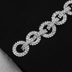 Robe mini bandage asymétrique sans manches à chaîne en strass