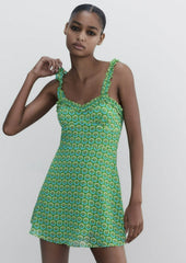 Robe courte verte à fleurs et bretelles à volants