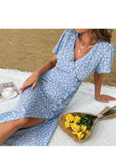 Robe fendue à boutons floraux