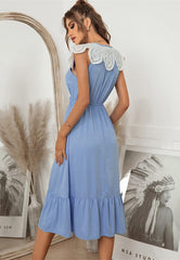Robe en dentelle festonnée à col noué