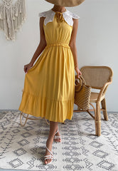 Robe en dentelle festonnée à col noué