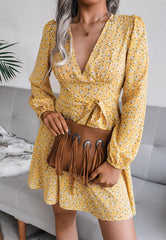 Robe longue à manches longues fleurie décolletée