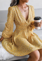 Robe longue à manches longues fleurie décolletée