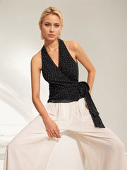Débardeur sans manches à pois, col halter et taille nouée