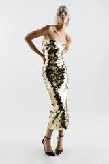 Robe longue dorée dos nu à paillettes et bustier