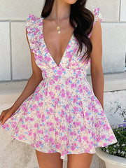 Robe mini imprimée à dos nu et à fleurs