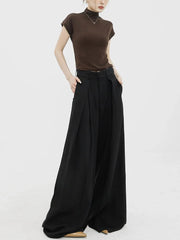 Pantalon palazzo large noir dramatique