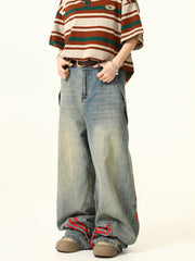 Jean en denim clair à jambes larges et triples rayures rouges