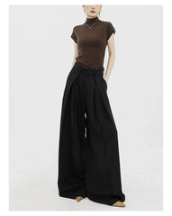 Pantalon palazzo large noir dramatique