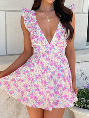 Robe mini imprimée à dos nu et à fleurs