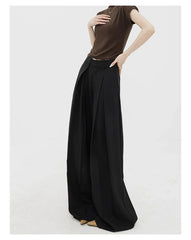 Pantalon palazzo large noir dramatique