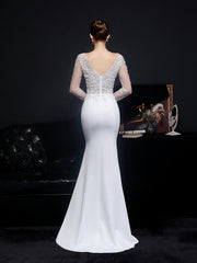 robe de soirée en dentelle à manches longues