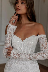 Robe de vacances à manches longues en dentelle brodée