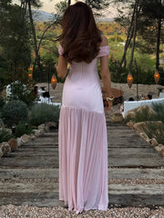 Robe moulante rose à imprimé floral et fronces