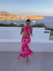 Robe longue rose brodée de fleurs