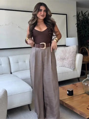 Pantalon satiné à ceinture et poches, jambes larges ... pantalon à poches et ceinture.