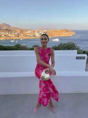 Robe longue rose brodée de fleurs