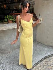 Robe moulante jaune spaghetti sans manches