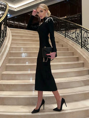 Robe de soirée dos nu à col roulé ajouré