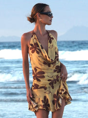 Robe florale en maille à épaules asymétriques