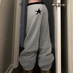 Pantalon évasé en maille à motif étoiles