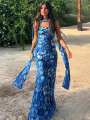 Robe de vacances bleue imprimée à dos nu et lacets