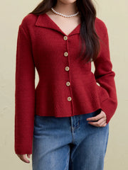 Gilet rouge en maille à manches bouffantes et col en V